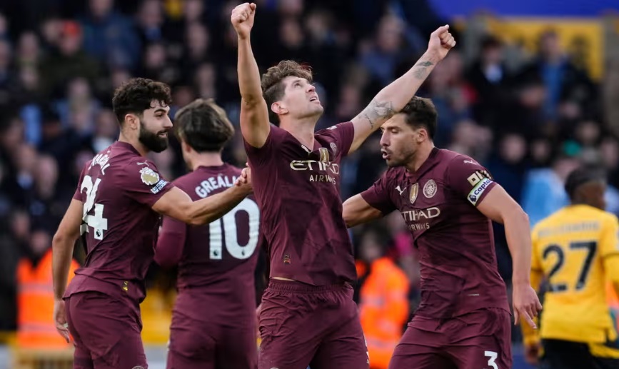 John Stones’ Late Header Secures Manchester City Victory at Molineux